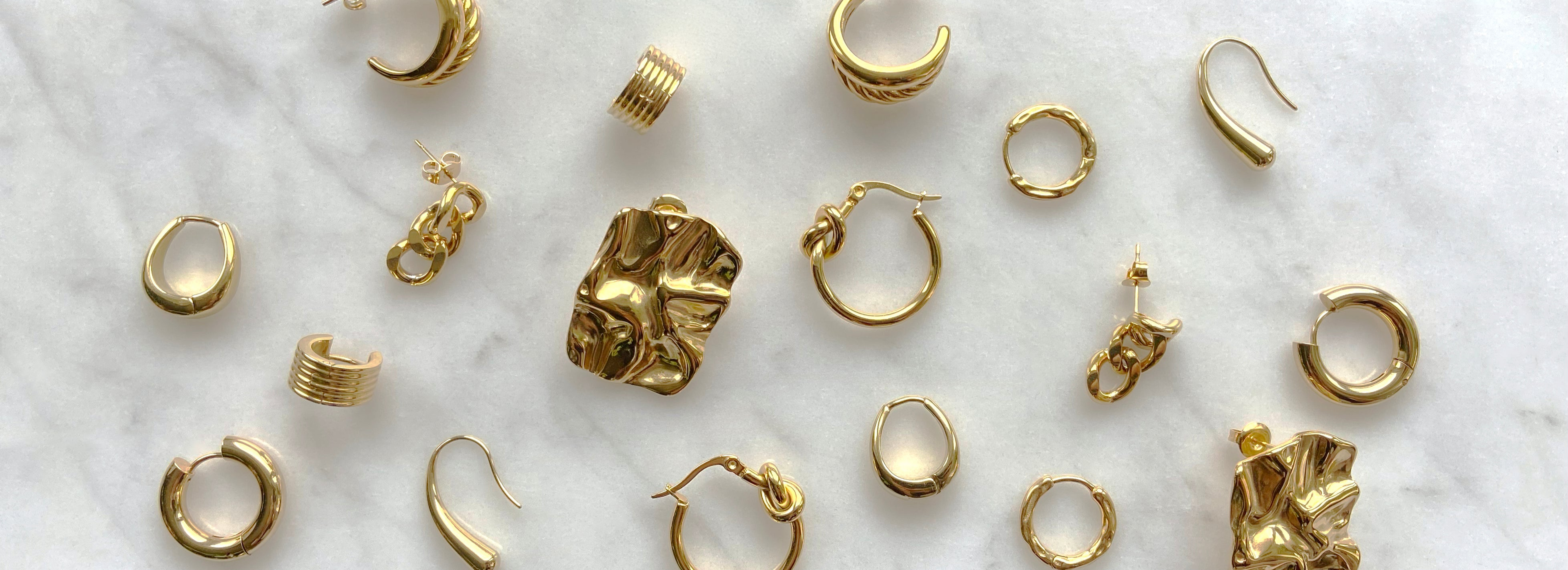 guldpläterade smycken örhängen ringar armband ani mockberg guldfynd hallbergs guld muli halsband